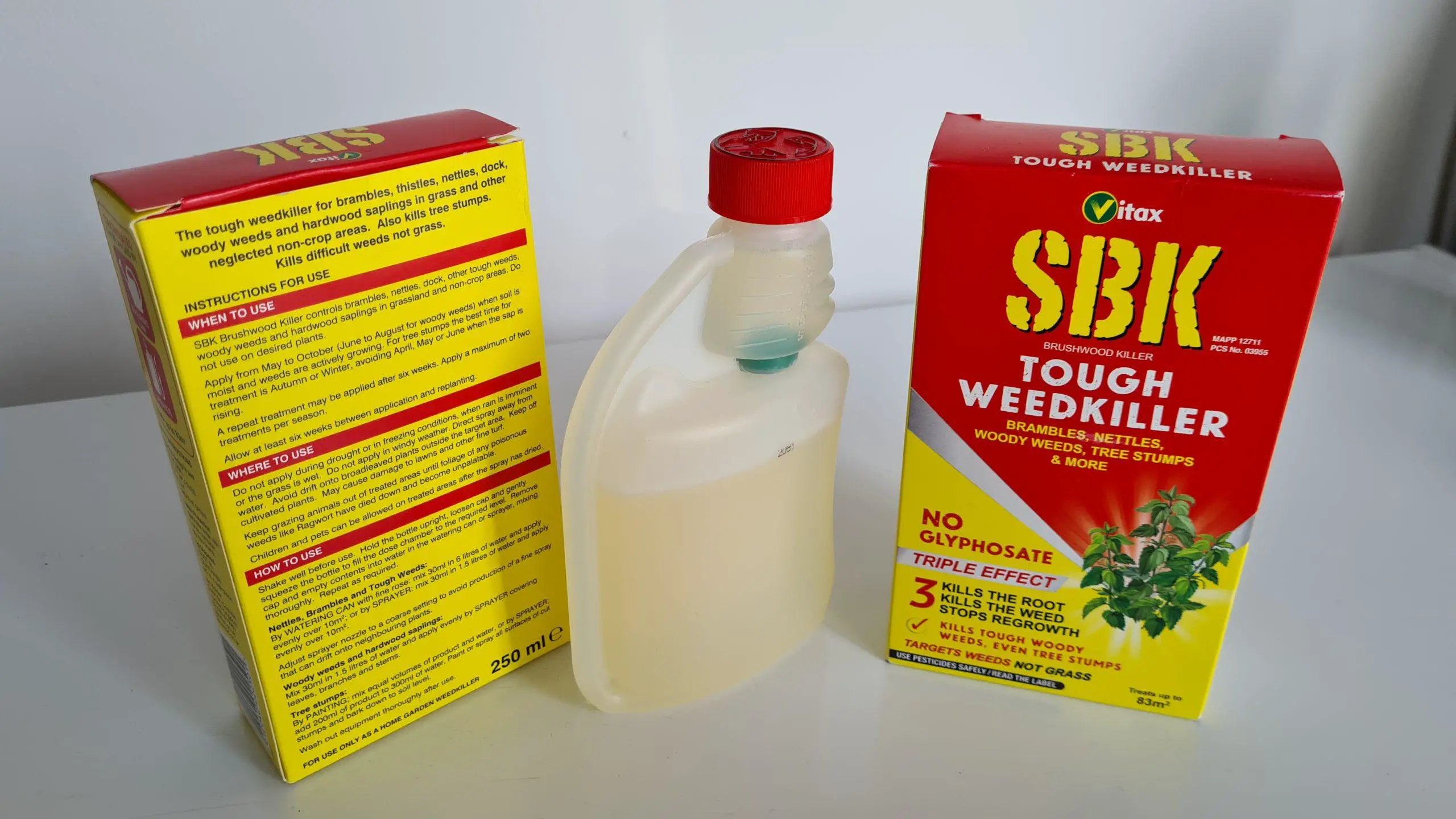 SBK weed killer packaging and contents on display